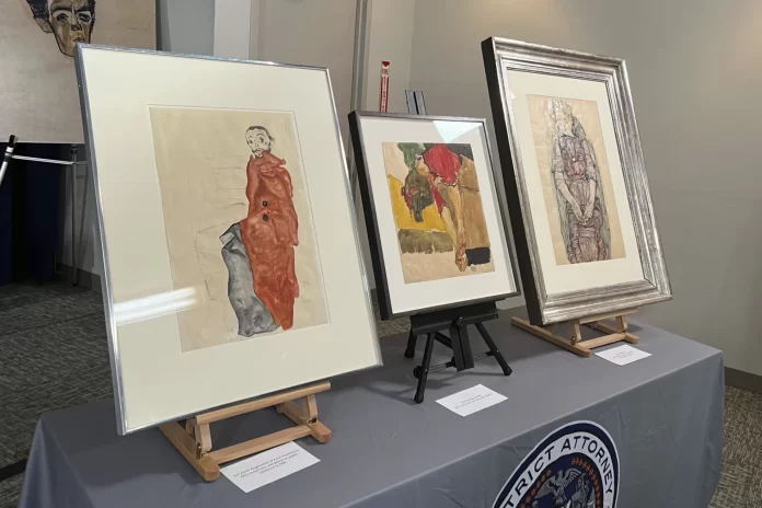 Karya seni Egon Schiele dipajang di kantor Kejaksaan Distrik Manhattan, New York, Rabu (20/9), dalam acara serah terima ke keluarga ahli waris Fritz Grunbaum.
