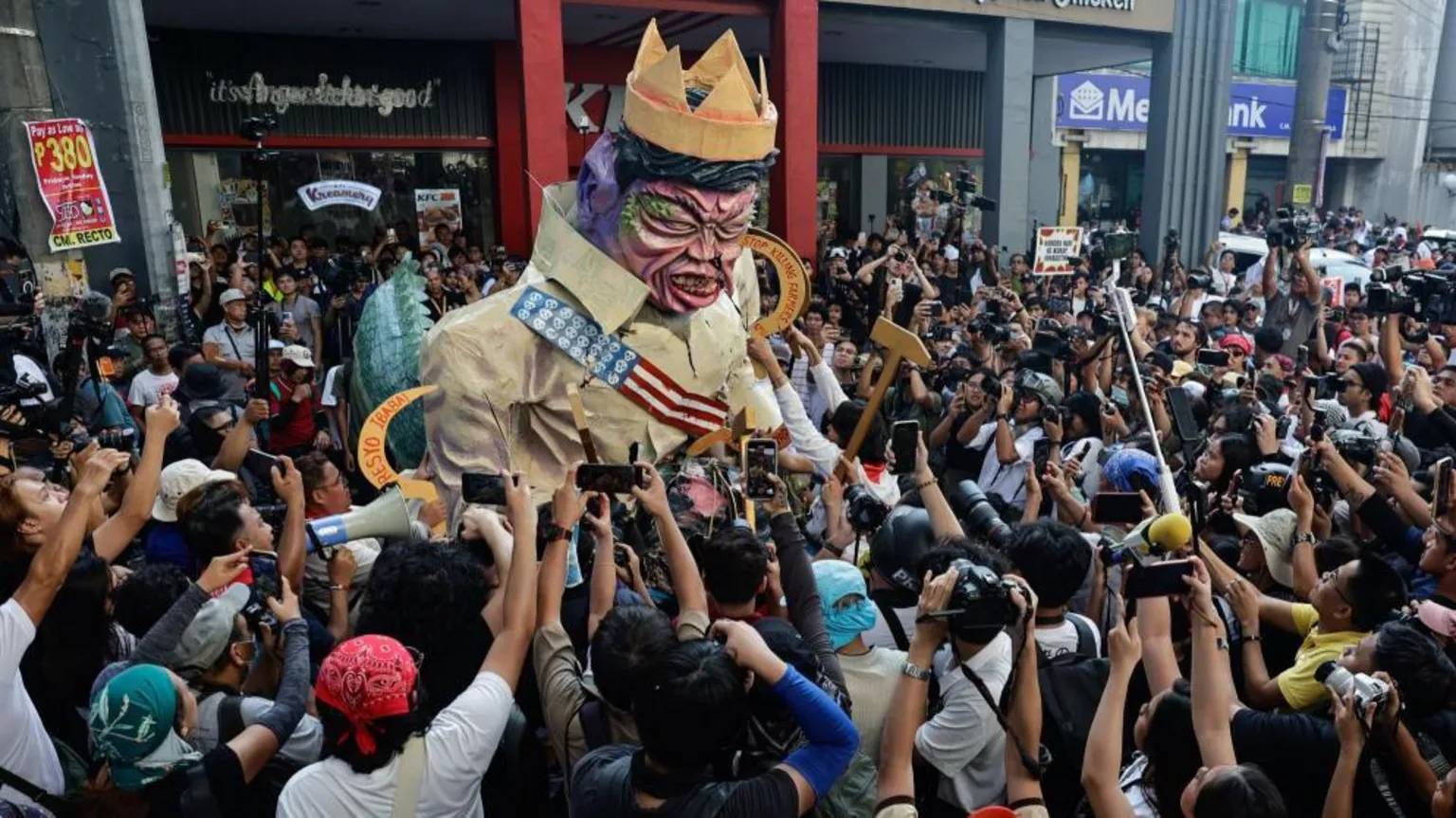 An effigy of President Ferdinand "Bongbong" Marcos J could be seen at Sunday's protests in Manila (Photo: EPA/BBC)