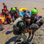 This sick villager was evacuated in Aceh on Saturday. (Photo: AFP via Getty Image/BBC)