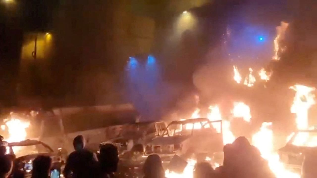 Protesters gather as vehicles burn, amid evolving anti-government unrest, in Tehran, Iran, in this screen grab obtained from a social media video released on January 9, 2026. (PHOTO: Social Media/via REUTERS/The Jerusalem Post).